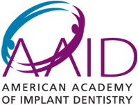 The image displays a logo with stylized text and graphic elements, which appears to be associated with an organization named AID American Implant Dentistry under the umbrella of AMERICAN ACADEMY OF IMPLANT DENTISTRY.